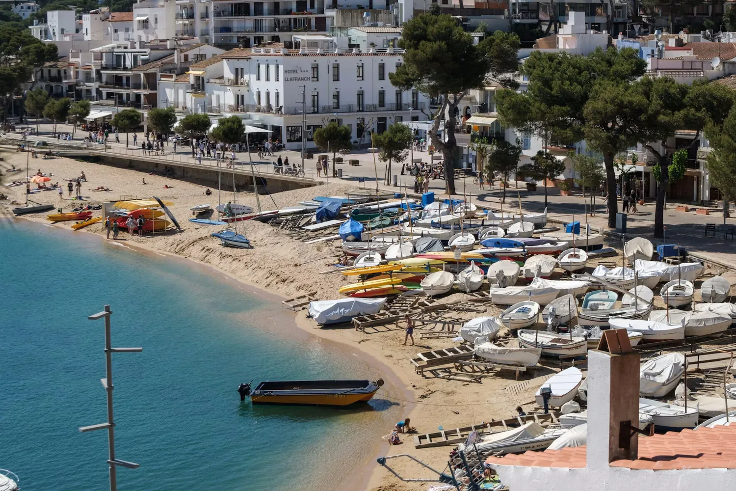 The seafront at Llafranc with fishing boats