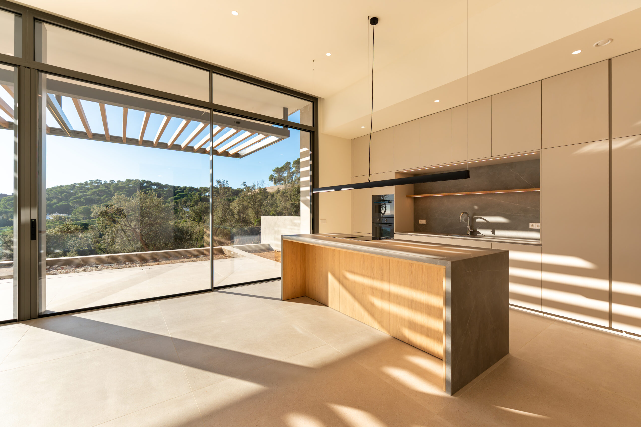 Kitchen with forest views