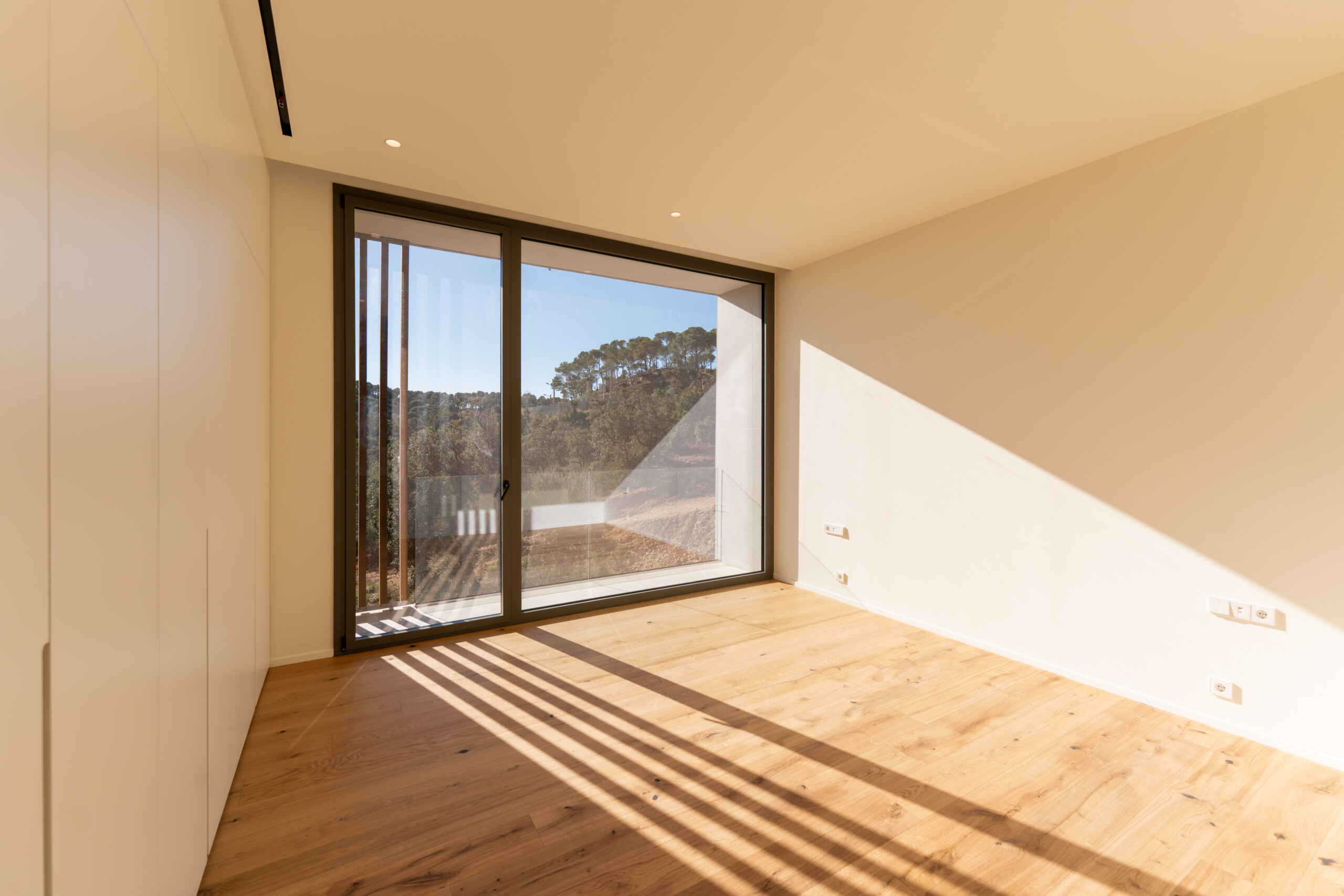 Bedroom with pine forest view