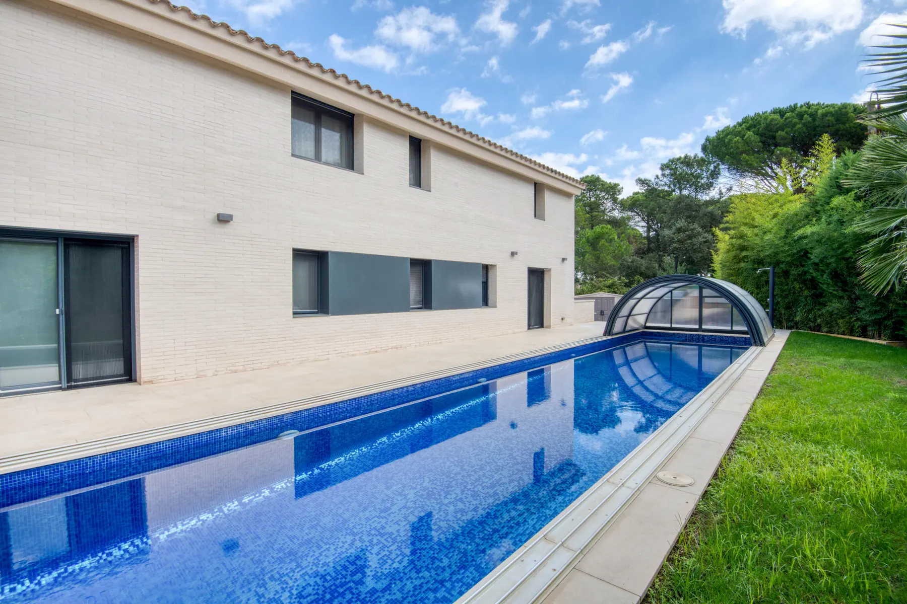 Pool and lawn in the afternoon