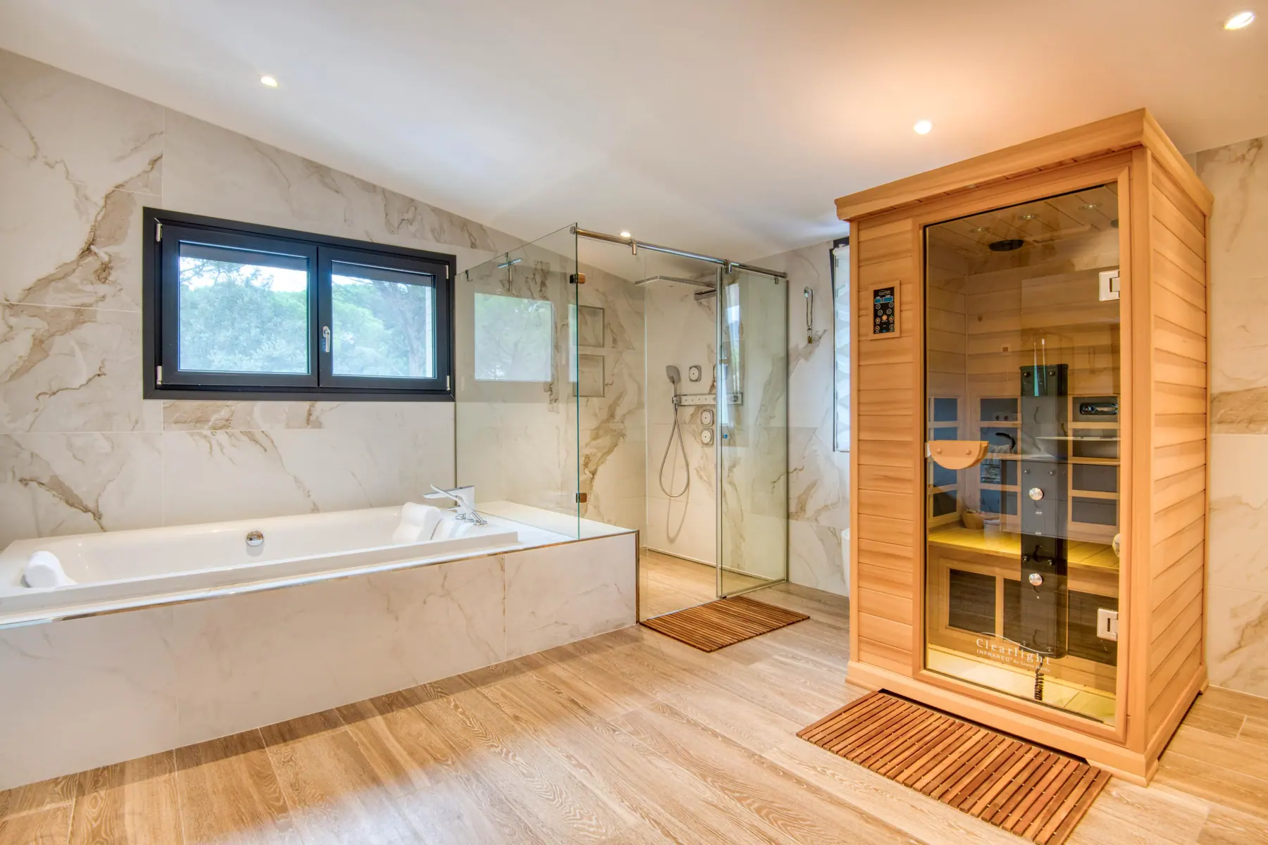 Sauna beside the marble bathroom