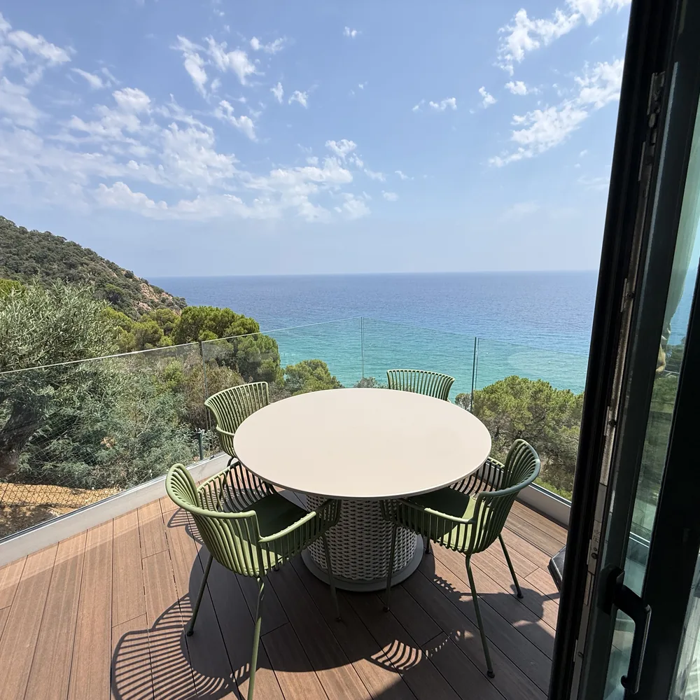 Terrace dining table under the pines