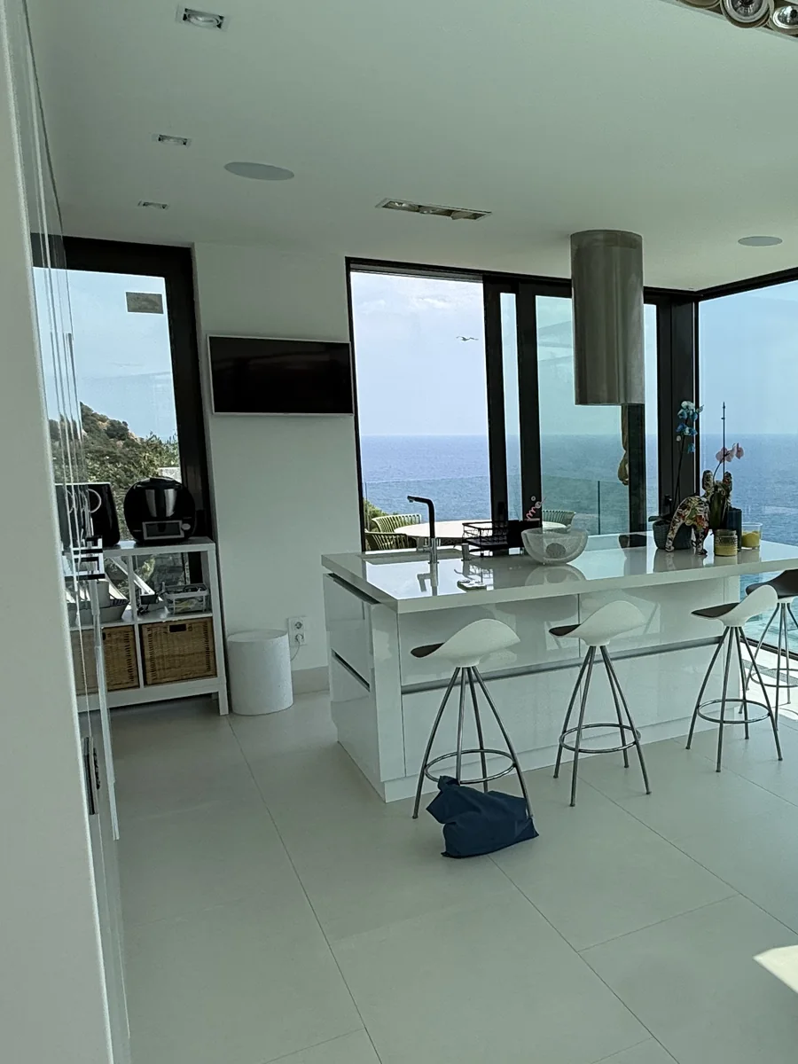 The kitchen island, with the sea behind it