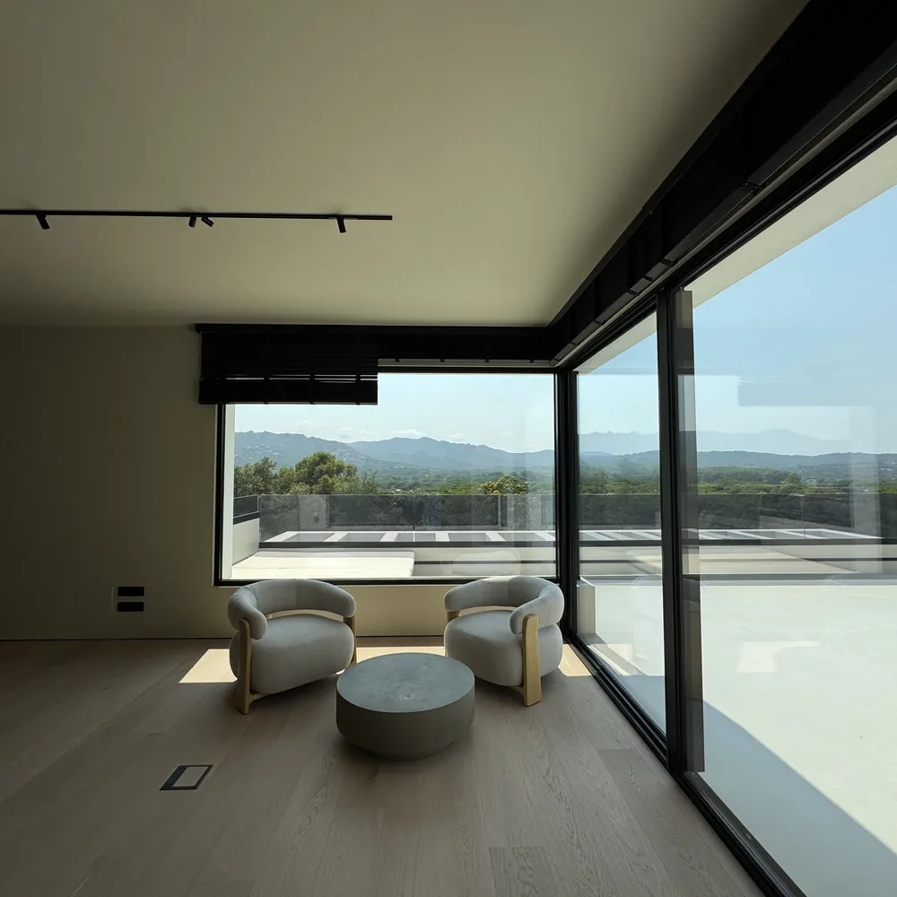 Living room and the terrace beyond the glass